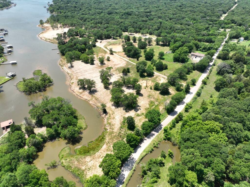 Albright Land & Development at Cedar Creek Lake | Sunrise Harbor raw land in active development.